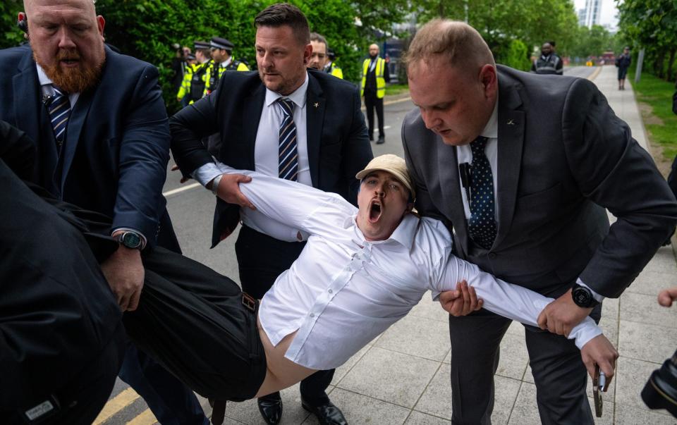 Climate protesters were removed from Shell's AGM