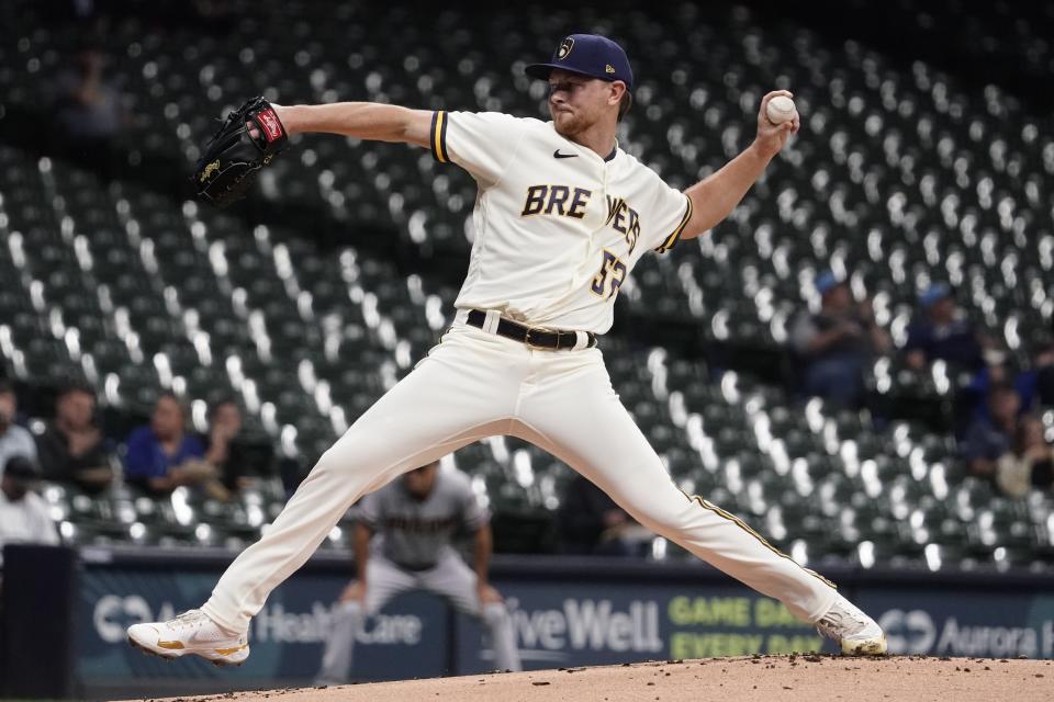 Milwaukee Brewers starting pitcher Eric Lauer throws during the first inning of a baseball game against the Arizona Diamondbacks Tuesday, Oct. 4, 2022, in Milwaukee. (AP Photo/Morry Gash)