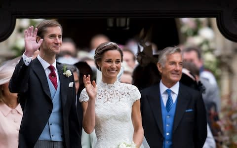 David Matthews, right, on the wedding day of his son James and Pippa Middleton. He is understood to deny the allegations - Credit: UK Press Pool/Getty Images