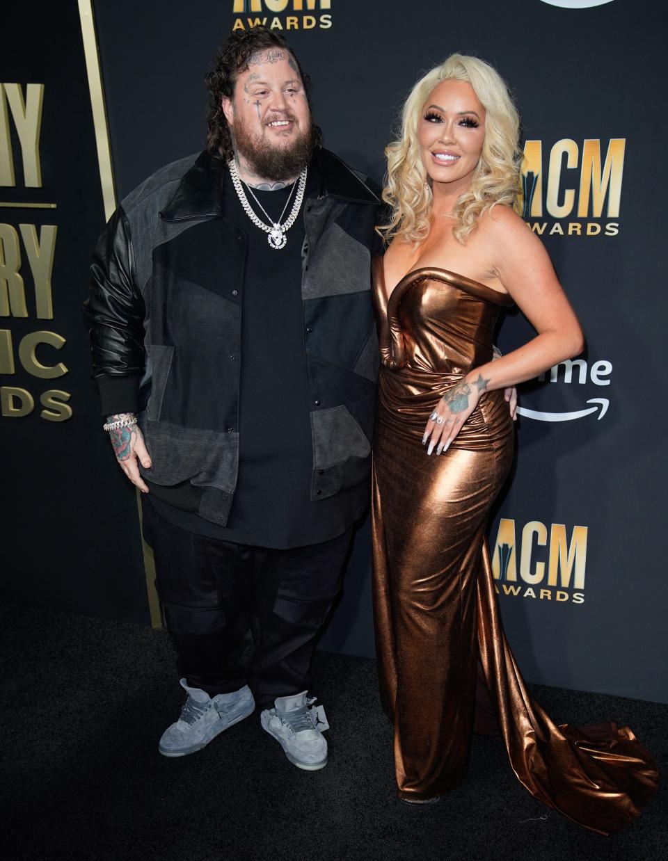 Jelly Roll and Bunnie XO arrive for the 58th ACM Awards at the Ford Center at the Star in Frisco Texas, on Thursday, May 11, 2023.