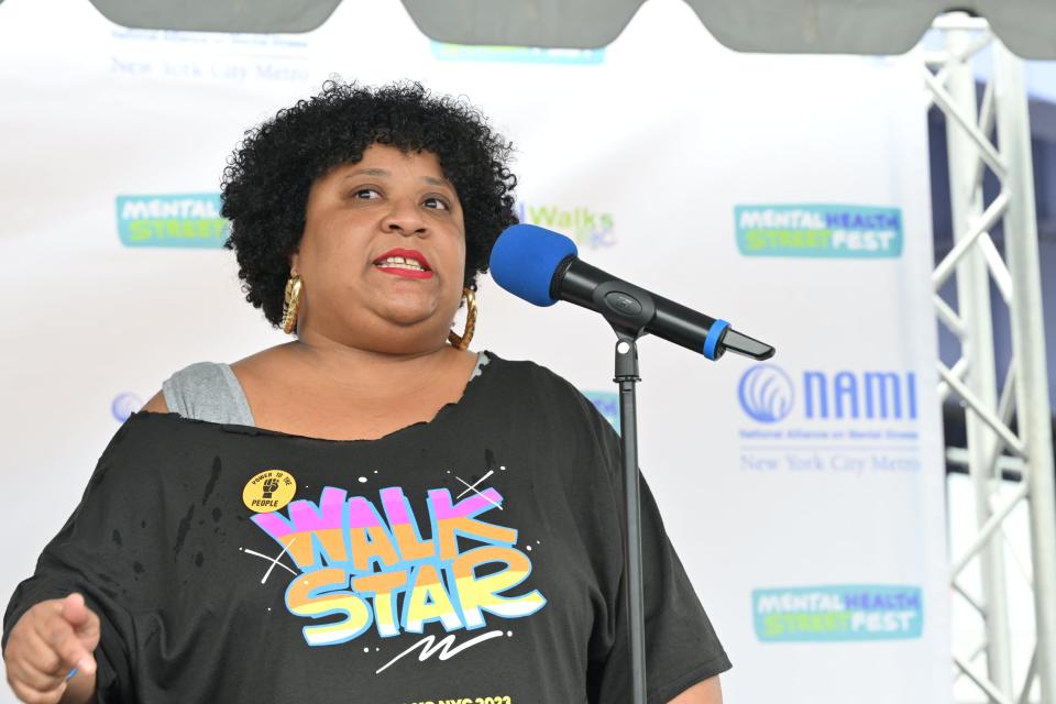 Tanisha Malcom speaking at the May 2023 NAMIWalks NYC + Mental Health Street Fest, the nation's largest mental health event.