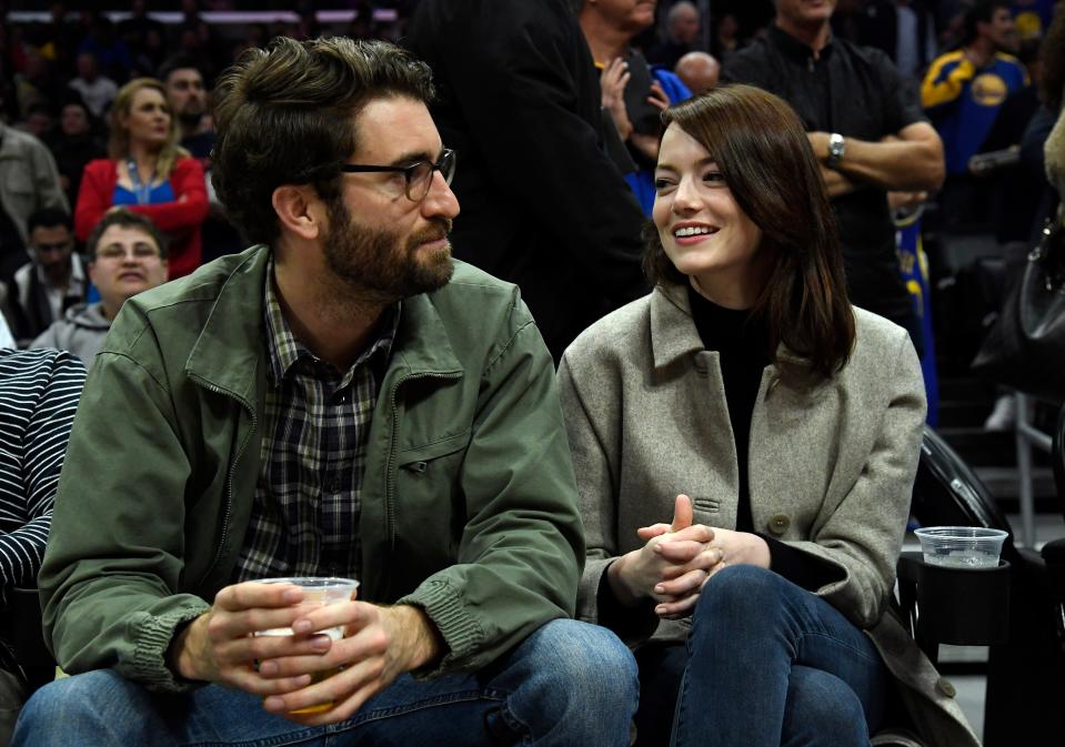 Emma Stone and Dave McCary attend a basketball game at Staples Center on January 18, 2019