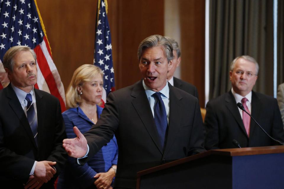 Canada's Ambassador to the US Gary Doer, center, stands with, from left, Sen. John Hoeven, R-N.D., Sen. Mary Landrieu, D-La., and American Petroleum Institute (API) President and CEO Jack N. Gerard and at a news conference on Capitol Hill in Washington, Tuesday, Feb. 4, 2014, regarding the approval of the Keystone XL pipeline. (AP Photo/Charles Dharapak)