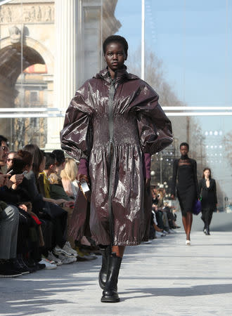 A model presents a creation by Bottega Veneta during the Milan Fashion Week in Milan, Italy February 22, 2019. REUTERS/Alessandro Garofalo