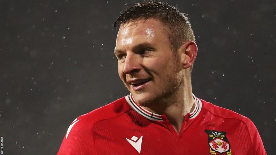 Paul Mullin looks on during a Wrexham game