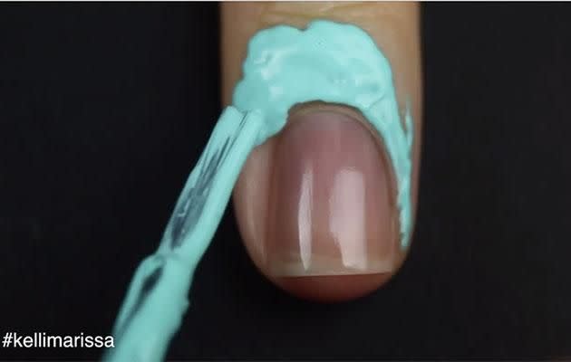 Step two: Cover the edges of your nails with 'liquid latex'.