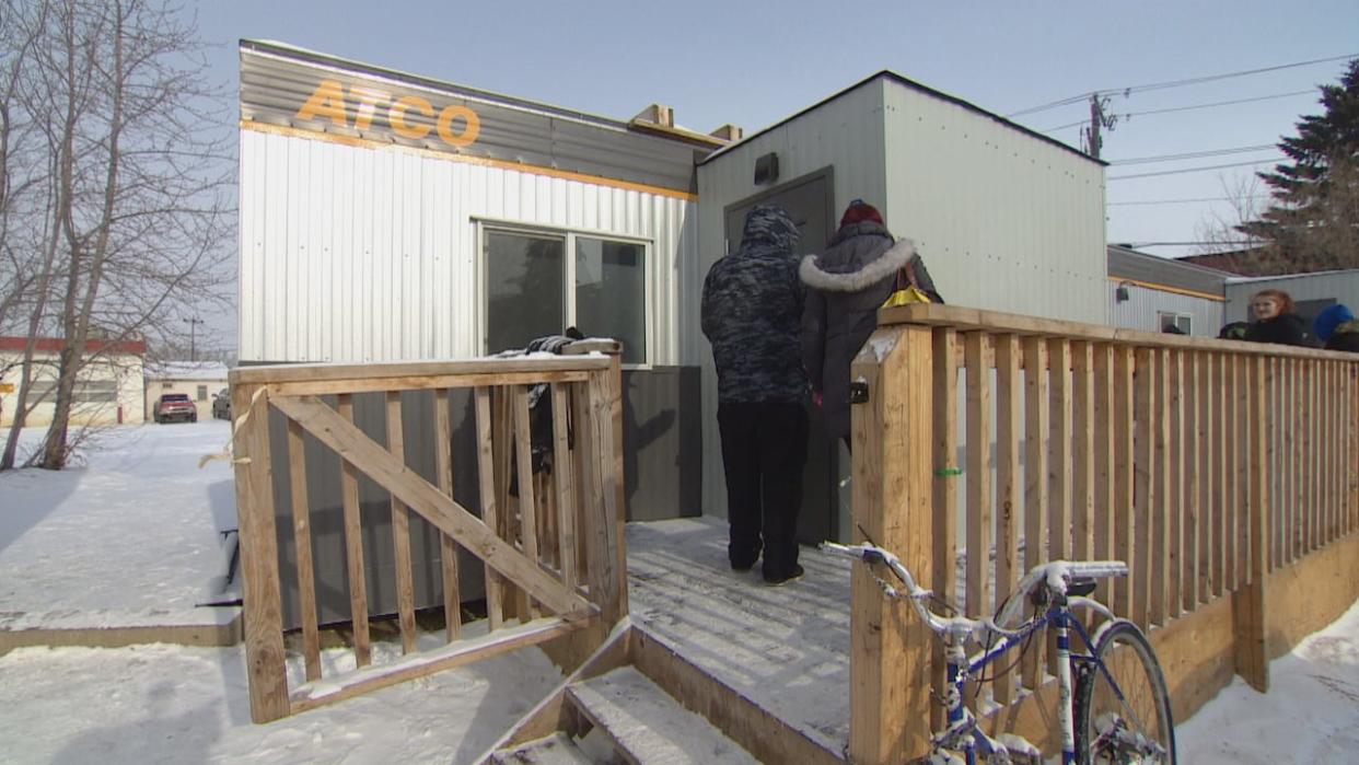 The overdose prevention site, operated by Alberta Health Services, is in the parking lot of the Safe Harbour homeless shelter.  (Trevor Wilson/CBC - image credit)