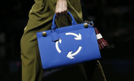 A model presents a creation from the Anya Hindmarch Autumn/Winter 2015 collection during London Fashion Week February 24, 2015. REUTERS/Suzanne Plunkett