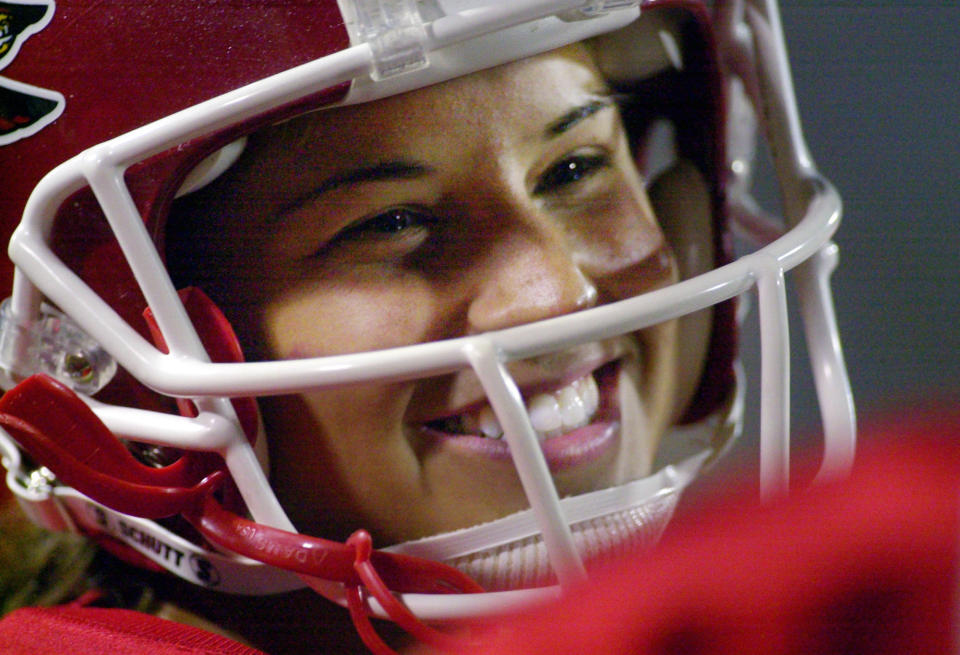 FILE - Jacksonville State University sophomore placekicker Ashley Martin (89) is all smiles after kicking an extra point in a 72-10 win over Cumberland in Jacksonville, Ala., Thursday, Aug. 30, 2001. (AP Photo/Dave Martin, File)