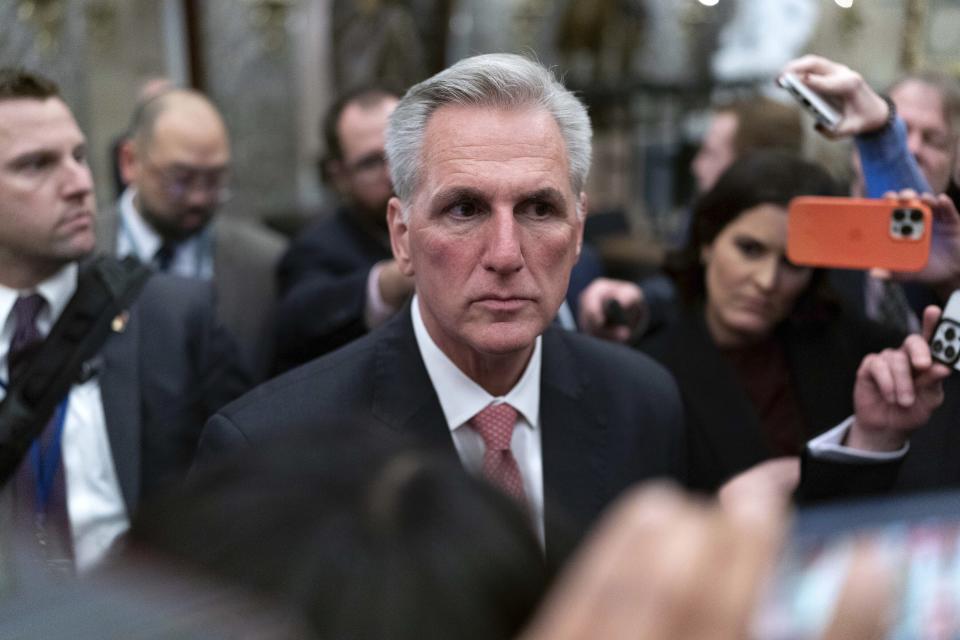 Rep. Kevin McCarthy, R-Calif., talks to reporters as he leaves the House floor after the House voted to adjourn for the evening as the House met for a third day to try and elect a speaker and convene the 118th Congress on Capitol Hill in Washington, Thursday, Jan. 5, 2023. (AP Photo/Jose Luis Magana)