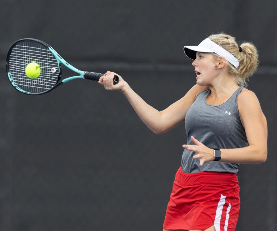 Canton South No. 1 singles player Marissa Zaleski returns a shot from Jackson's Alessandra McCann, Monday, Sept. 25, 2023.