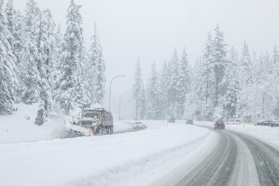 Traveling by car during winter storm conditions/Getty Images