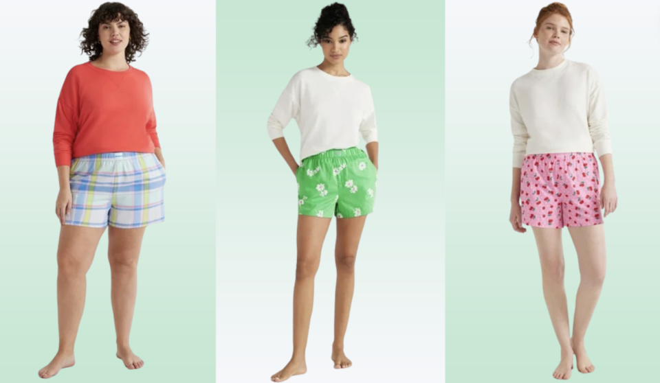 Three women wearing different patterned pajama shorts