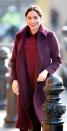 <p>Meghan was spotted in a similar burgundy coat and dress while visiting the Hubb Community Kitchen in 2018. Such a nice color on her. </p>