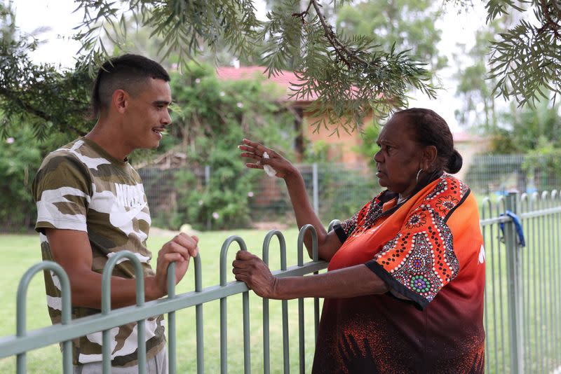 Indigenous Muruwari elder Rita Wright speaks with her nephew in Sydney