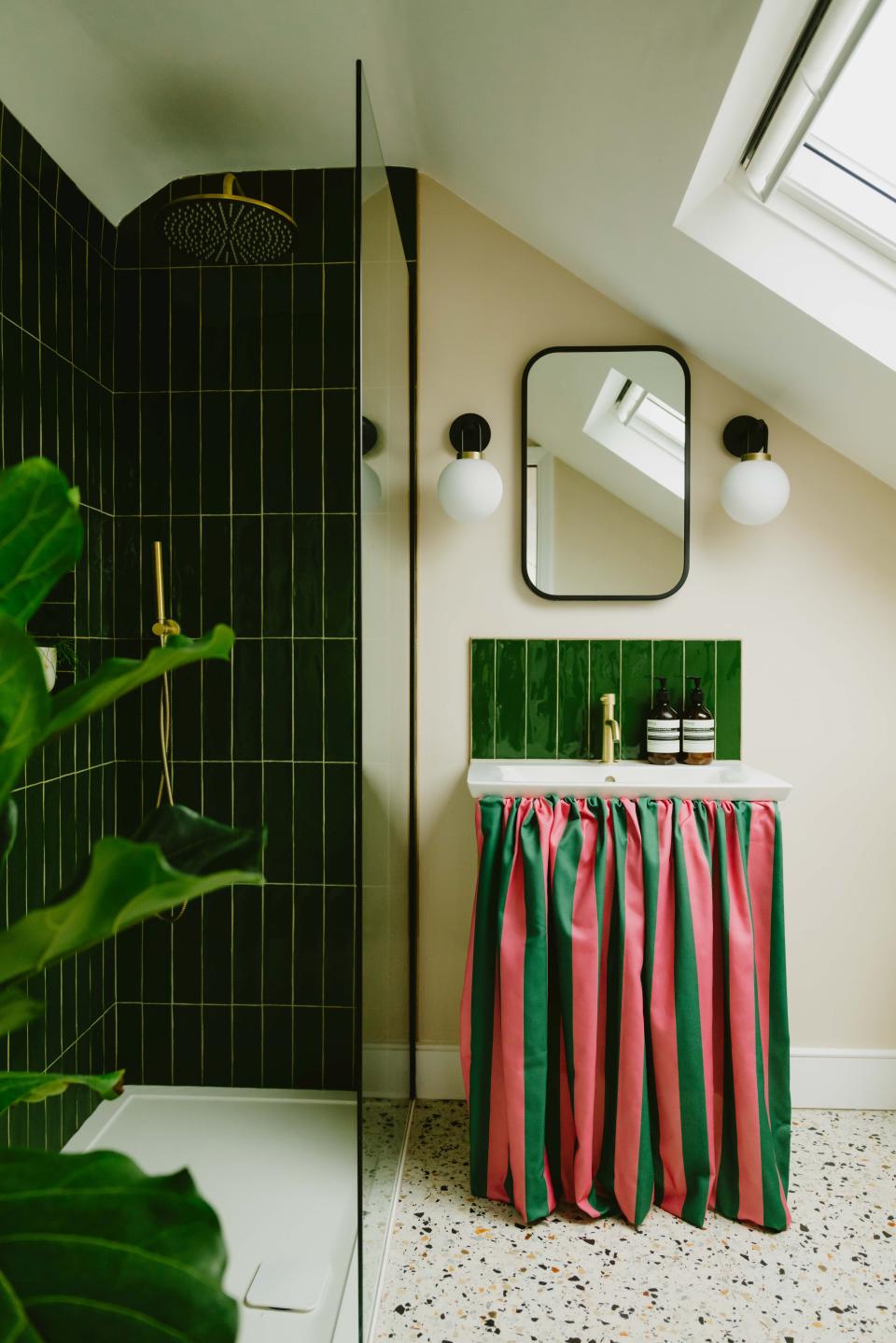 green bathroom with sink skirt