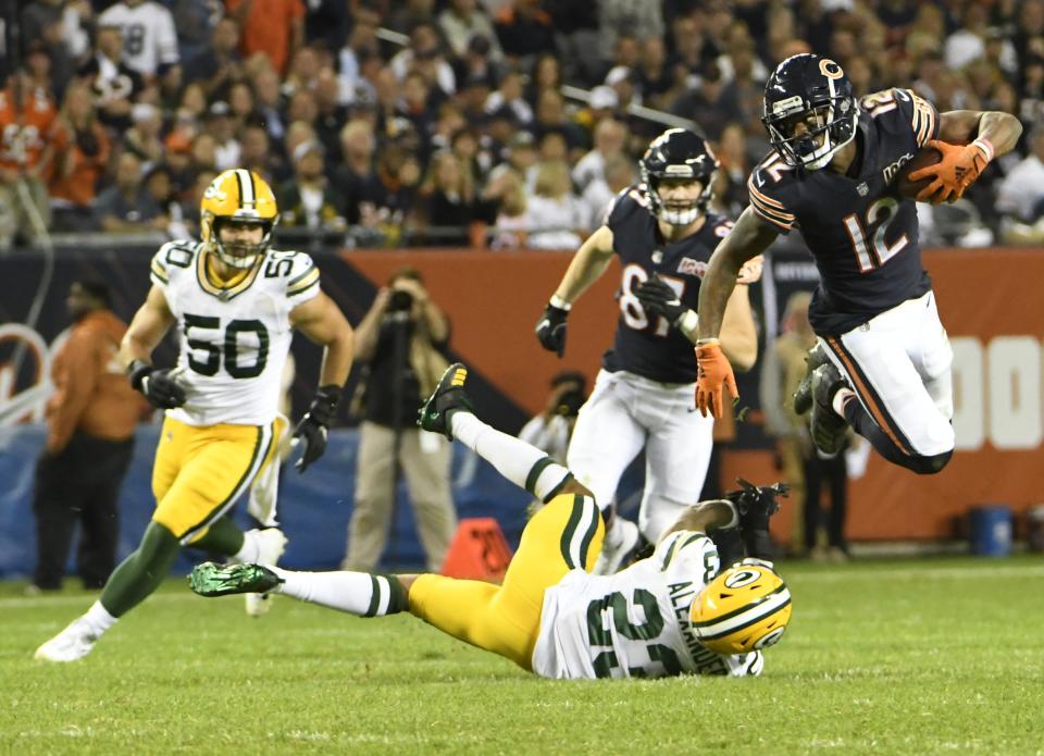 Chicago Bears' Allen Robinson runs past Green Bay Packers' Jaire Alexander during the second half of an NFL football game Thursday, Sept. 5, 2019, in Chicago. The Packers won 10-3. (AP Photo/David Banks)