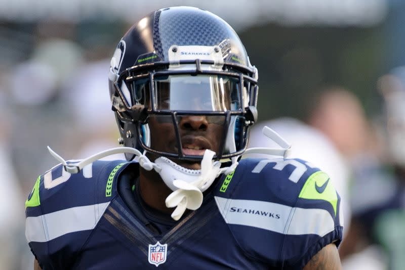 Seattle Seahawks defensive back Phillip Adams warms up prior to the NFL game against the Tennessee Titans