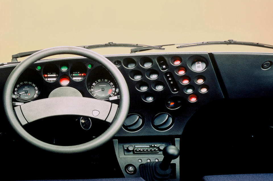 <p>It had the aerodynamics of a stapler, with the office accessory arguably more exciting to look at than the Trevi. Lancia brought in an architect to design its <strong>‘Swiss cheese’</strong> dashboard which caused global controversy. Today, it makes our glorious dashboard list not only because of its oddball layout, but because Lancia, once again, dared to be different.</p>