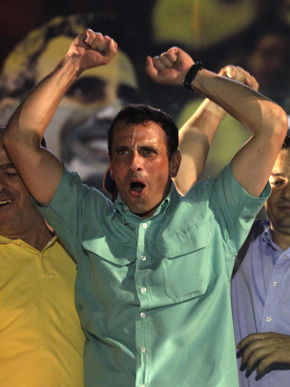 FILE - In this Sunday Feb. 12, 2012 file photo, Henrique Capriles celebrates after wining the opposition presidential primary in Caracas, Venezuela. Venezuela's President Hugo Chavez finds himself ailing as he heads into a re-election campaign against Capriles, a 39-year-old state governor who represents a younger and more energetic option, said Diego Moya-Ocampos, an analyst with the London-based consulting firm IHS Global Insight. (AP Photo/Ariana Cubillos, File)