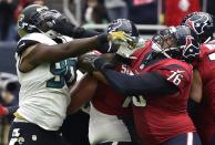 <p>Jacksonville Jaguars’ Malik Jackson (90) and Houston Texans’ Duane Brown (76) shove each other after a play during the first half of an NFL football game Sunday, Dec. 18, 2016, in Houston. (AP Photo/Eric Christian Smith) </p>