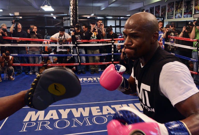 Boxer Floyd Mayweather works out at the Mayweather Boxing Club on April 17, 2013 in Las Vegas, Nevada. Mayweather says neither jail time nor ring rust from a one-year layoff will diminish him next week when he returns against compatriot Robert Guerrero