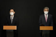 U.S. Special Representative for North Korea, Sung Kim, right, speaks during a briefing after a meeting with South Korea's Special Representative for Korean Peninsula Peace and Security Affairs Noh Kyu-duk at a hotel in Seoul, South Korea, Sunday, Oct. 24, 2021. (AP Photo/Ahn Young-joon, Pool)