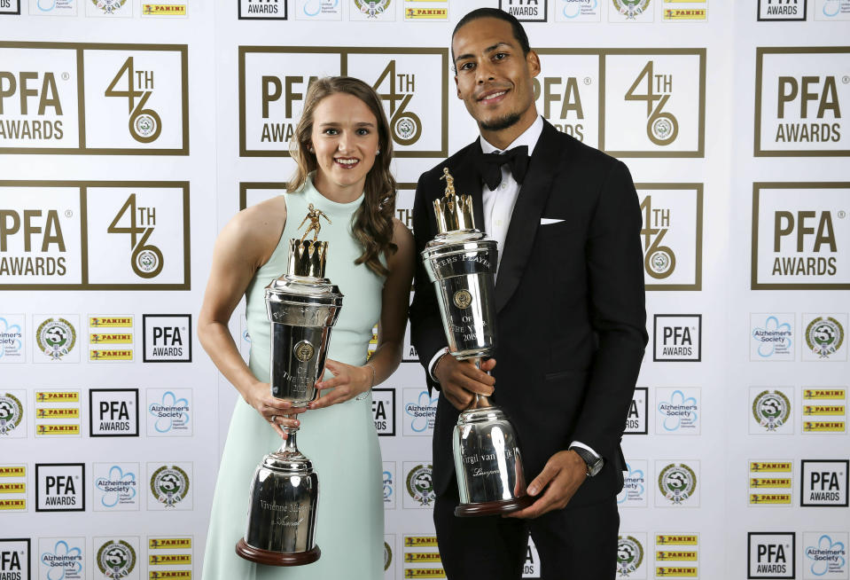 Liverpool’s Virgil van Dijk poses with his PFA Player of the Year award with PFA Female Player of the Year Arsenal’s Vivianne Miedema during the 2019 PFA Awards at the Grosvenor House Hotel, London in 2019. (Photo: Barrington Coombs/PA via AP)