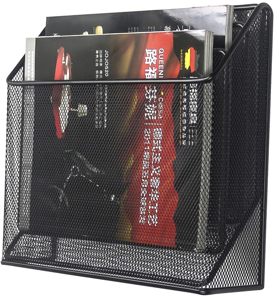 a black steel mesh desktop organizer containing a manual