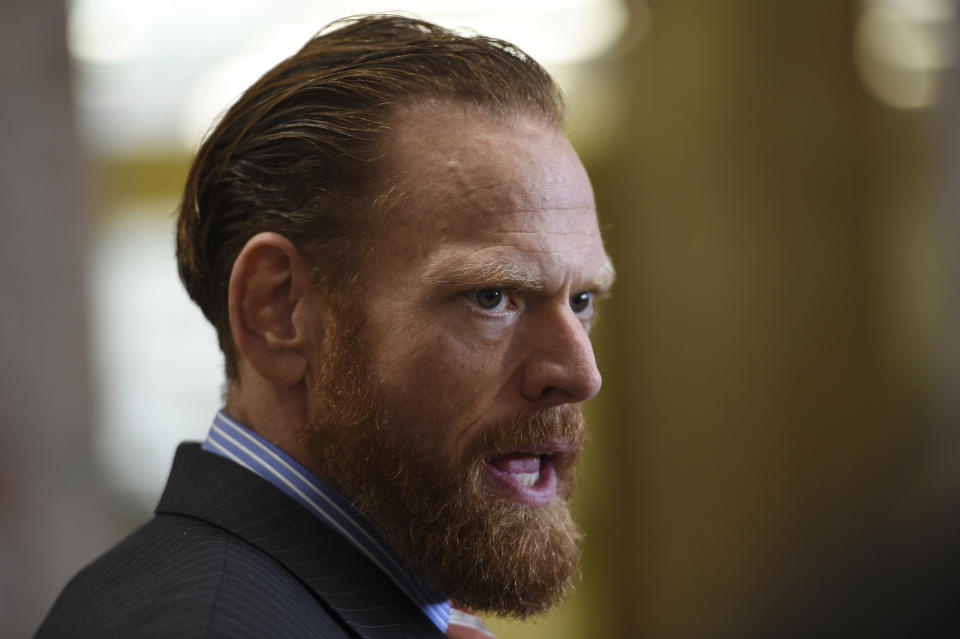 Attorney Curtis Briggs, who represents Max Harris, speaks to the media at Alameda County Courthouse in Oakland, Calif., Tuesday, April, 30, 2019. Two defendants, Derick Almena and Harris are standing trial on charges of involuntary manslaughter after a 2016 fire killed 36 people at a warehouse party they hosted in Oakland. (AP Photo/Cody Glenn)