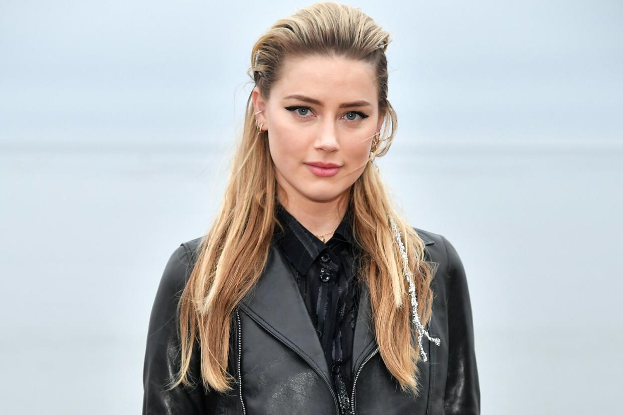 Amber Heard attends the Saint Laurent Mens Spring Summer 20 Show on June 06, 2019 in Paradise Cove Malibu, California.