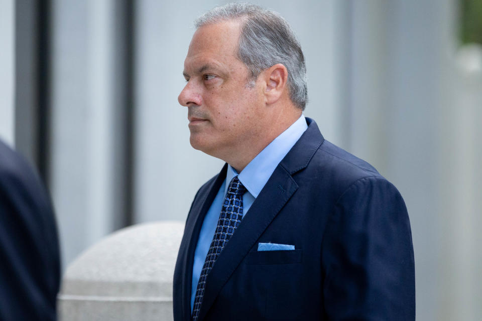 Scott Maddox walks with his lawyers into the U.S. Courthouse in downtown Tallahassee for sentencing for his federal corruption charges with Paige Carter-Smith Thursday, Sept. 9, 2021.