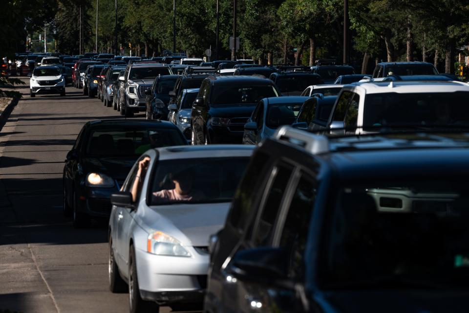 Southbound vehicles back up on College Avenue before crossing Drake Road on Aug. 14, 2023, in Fort Collins. The intersection is often congested during high-traffic times of day.