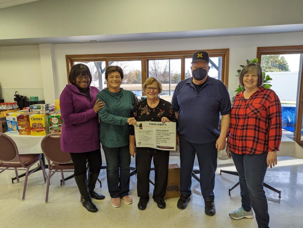 Food drive volunteers are (from left) Jo Anne Bray, Janet Allen, Lois White, Tom Heywood and Peggy Behrendt. Volunteers not pictured are Valerie Bezeau, Tommy Bray, Paula Diehl, Jim Cooley, Mary Goode, Joann Kunich, Debbie Lentz,  Clara Lloyd, Brenda Lewis, and Patricia Rousselo.