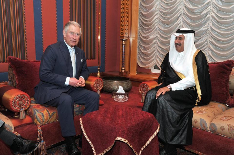 The Prince of Wales with the then Qatari prime minister Sheikh Hamad Bin Jassim in Doha in 2013 (PA) (PA Archive)