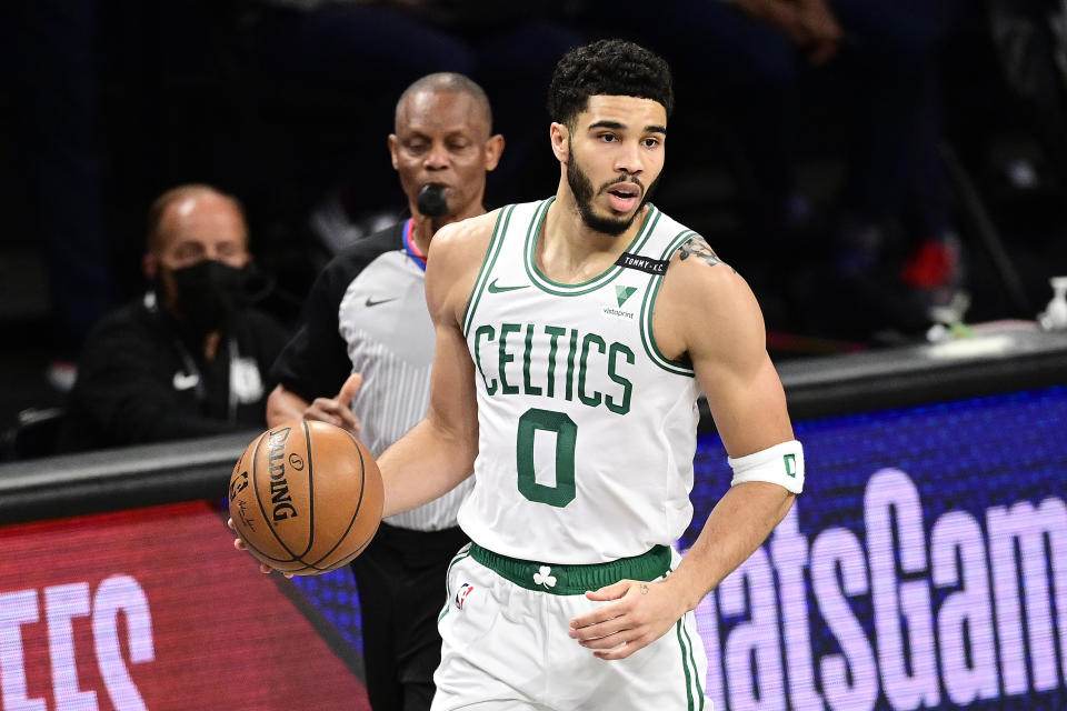  Jayson Tatum #0 of the Boston Celtics handles the ball against the Brooklyn Nets in Game Five of the First Round of the 2021 NBA Playoffs at Barclays Center on June 01, 2021 in the Brooklyn borough of New York City. NOTE TO USER: User expressly acknowledges and agrees that, by downloading and or using this photograph, User is consenting to the terms and conditions of the Getty Images License Agreement. (Photo by Steven Ryan/Getty Images)