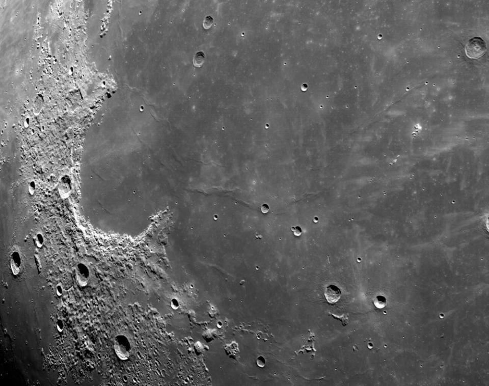 Cameras aboard the Orion capsule beamed back spectacular images, including this closeup of the surface of the moon. / Credit: NASA