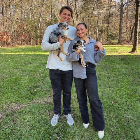 <p>Madisyn Seager Instagram</p> Corey Seager with his wife Madisyn and their two dogs, Hazel and Harlow, in November 2022.