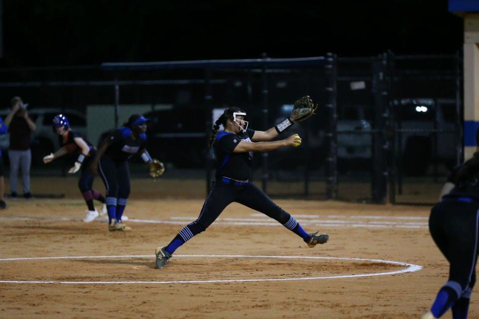 Wellington softball's Victoria Payne pitches against Palm Beach Gardens on Friday, March 1, 2024.
