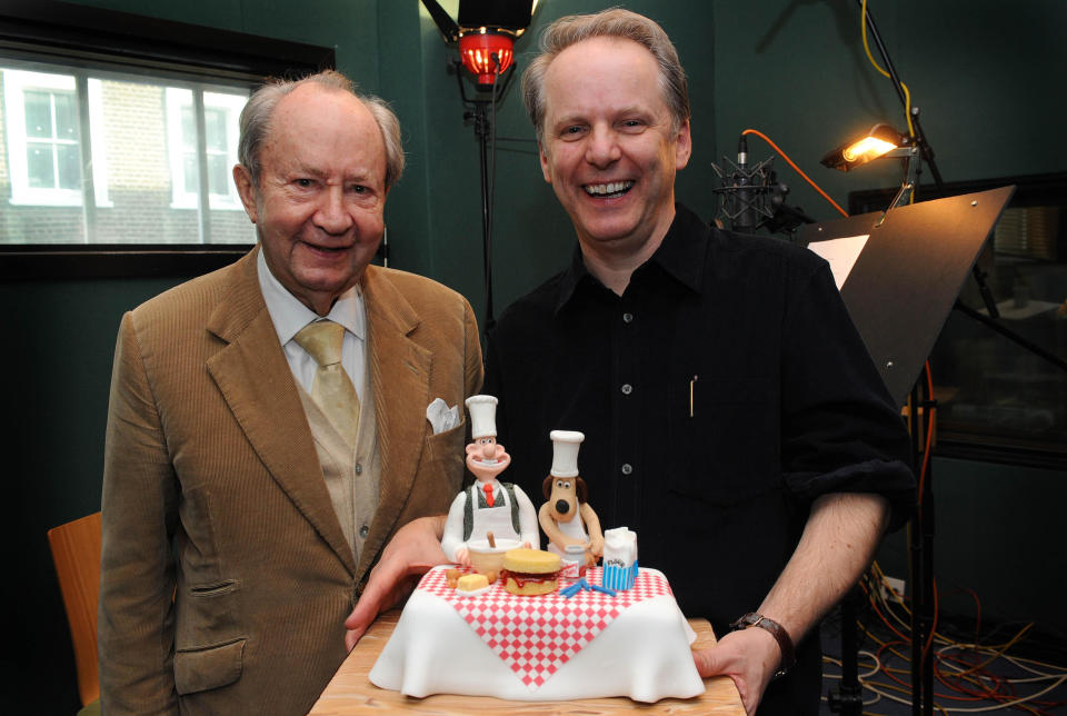 Peter Sallis (left) is presented with a suprise birthday cake, by Wallace & Gromit creator Nick Park, on the occasion of his 87th birthday, whilst in the studio recording for the forthcoming Wallace & Gromit TV special 'A Matter of Loaf & Death', (TX: TBC Christmas 2008) at The Sound Company, in London.