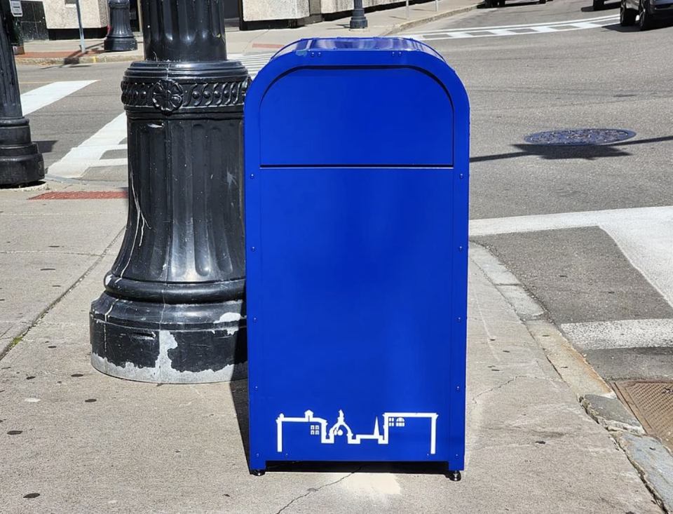 a trash can that looks like a mailbox