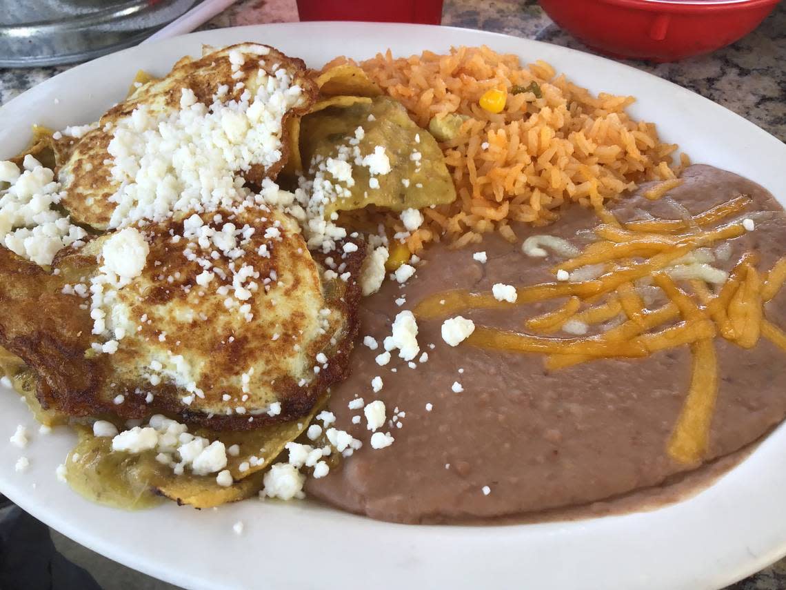 Mexico Mi Amor offers Chilaquiles Verdes, tortilla chips with verde sauce, queso fresco, sour cream and a fried egg. You can also add chicken. Janet Patton/jpatton1@herald-leader.com