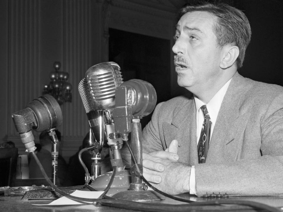 Walt Disney shown as he told the House Unamerican activities Committee that communists "once, took over my studio."