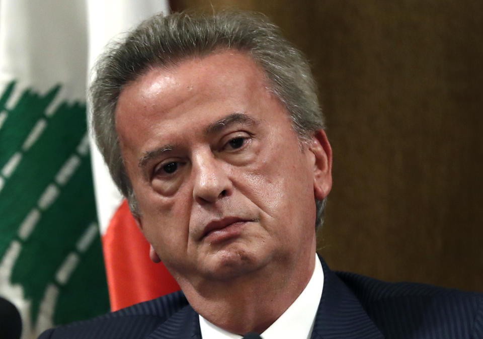 FILE - Riad Salameh the governor of Lebanon's Central Bank, listens to a journalist's question during a press conference, in Beirut, Lebanon, Nov. 11, 2019. The United States, United Kingdom, and Canada Thursday slapped sanctions on Lebanon's embattled ex-central bank governor and four family members and close associates for corruption, the U.S. Treasury Department said. Salameh, 73, ended on July 31, 2023 his 30-year tenure under a cloud of investigation and blame for his country's historic economic crisis. (AP Photo/Hussein Malla, File)