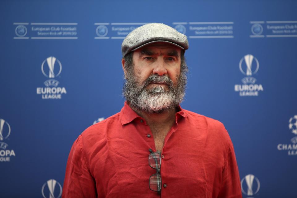 French former soccer star Eric Cantona poses to the photographers before the UEFA Champions League group stage draw at the Grimaldi Forum, in Monaco, Thursday, Aug. 29, 2019. (AP Photo/Daniel Cole)