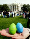 <p>Wooden Easter eggs with President Bush and Laura Bush’s signature are given, Monday, April 21, 2003, to those who take part in the annual Easter Egg Roll at the White House. President Bush and wife Laura return later from a Easter weekend stay at the Crawford, Texas, ranch. (Photo: Ron Edmonds/AP) </p>