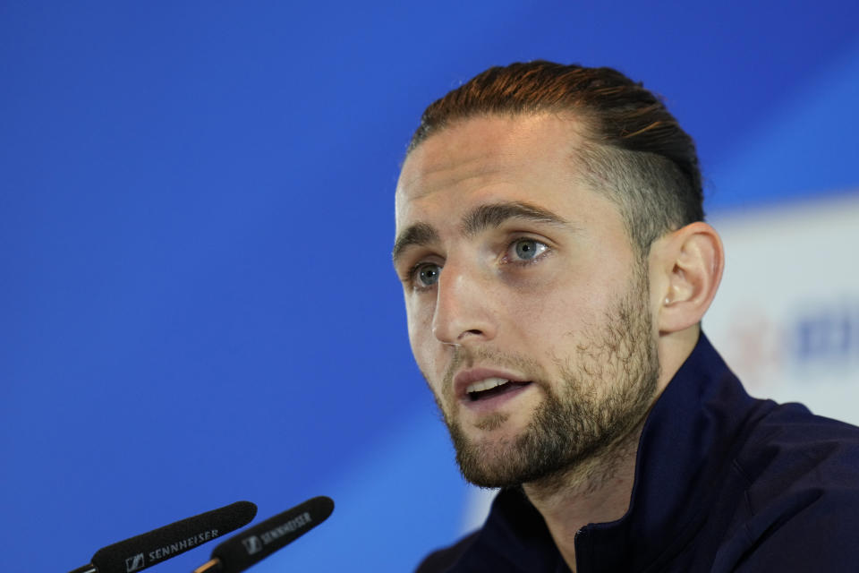 France's Adrien Rabiot speaks during a press conference in Paderborn, Germany, Wednesday, June 19, 2024. France will play against Austria during their Group D soccer match at the Euro 2024 soccer tournament on June 17. (AP Photo/Hassan Ammar)