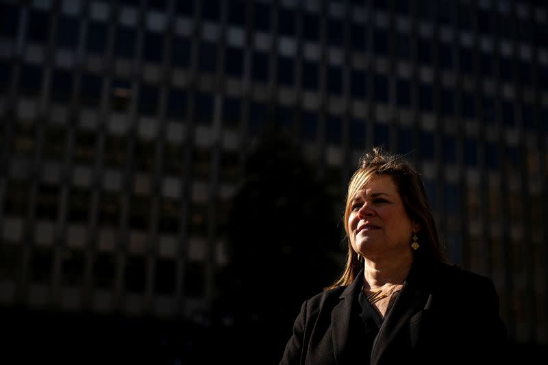 Former U.S. Chief Immigration Judge Keller poses for a portrait in front of the U.S. Department of Justice's Arlington Immigration Court