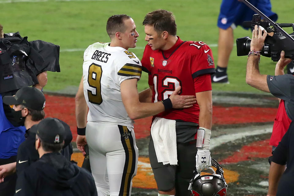 In case you missed it, and you probably did, here's Drew Brees consoling Tom Brady Sunday night. (Photo by Cliff Welch/Icon Sportswire via Getty Images)