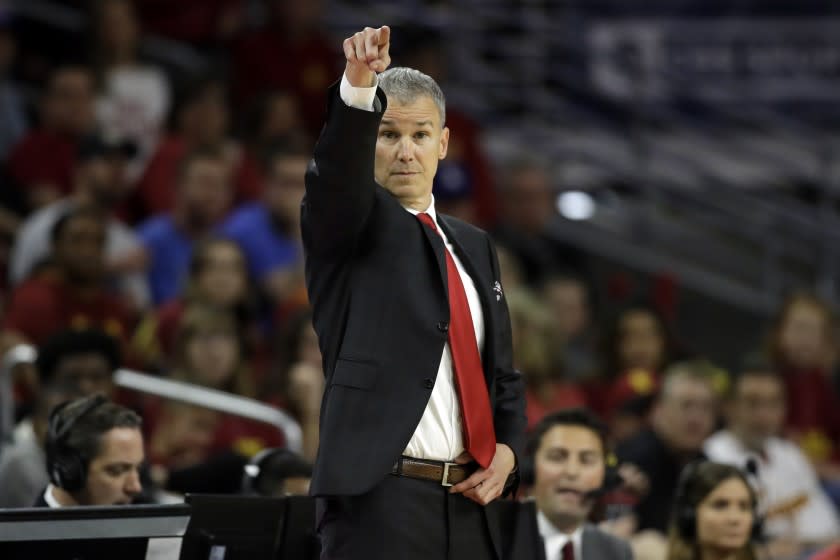 Southern California head coach Andy Enfield signals during the second half of an NCAA college basketball game against Southern California Saturday, March 7, 2020, in Los Angeles. (AP Photo/Marcio Jose Sanchez)